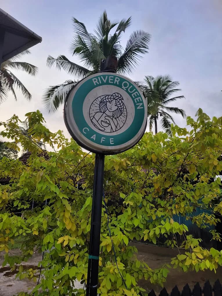 River Queen cafe logo signboard in Kudmar, Shantimogaru - best cafe in Puttur
